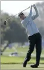  ?? CHRIS CARLSON — THE ASSOCIATED PRESS ?? Ryan Palmer watches his tee shot on the second hole hole of the North Course at Torrey Pines Golf Course during the second round of the Farmers Insurance Open golf tournament Friday in San Diego.