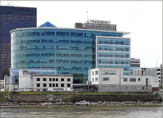  ?? LISA POWELL / STAFF ?? The CareSource building fronts the Great Miami River in Dayton. CareSource manages 1.8 million Medicaid policies, the largest such plan in the state.