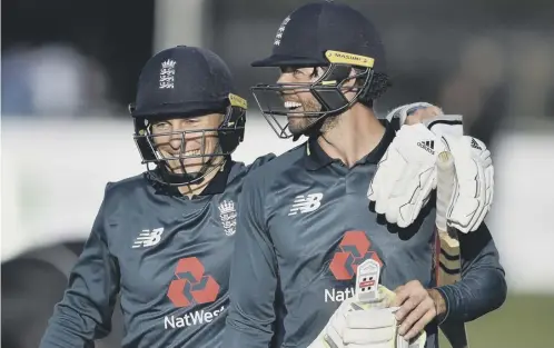  ??  ?? 0 Ben Foakes, right, and Tom Curran of England walk off after winning yesterday’s one- day internatio­nal against Ireland at Malahide.