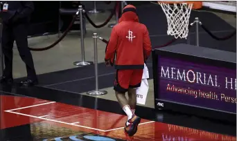  ?? CARMEN MANDATO —THE ASSOCIATED PRESS ?? James Harden leaves the court following a loss to the Lakers on Sunday in Houston.