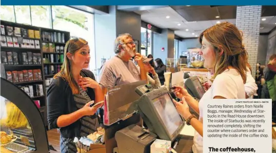  ?? STAFF PHOTO BY ERIN O. SMITH ?? Courtney Raines orders from Noelle Boggs, manager, Wednesday at Starbucks in the Read House downtown. The inside of Starbucks was recently renovated completely, shifting the counter where customers order and updating the inside of the coffee shop.