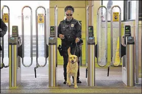  ?? HYOSUB SHIN / HSHIN@AJC.COM ?? “Although MARTA police can’t be everywhere, the officers are vigilant about looking out for suspicious behavior throughout the system and rely on MARTA customers to be our eyes and ears,” agency spokeswoma­n Alisa Jackson said.