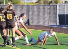  ?? JIM THOMPSON/JOURNAL ?? Volcano Vista’s Lauren Machuca, left, reaches for teammate Natalia Bruciaga after Bruciaga’s second-half goal on Wednesday.