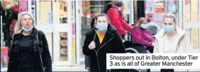  ??  ?? Shoppers out in Bolton, under Tier 3 as is all of Greater Manchester
Michelle Reilly