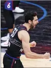  ?? MATT SLOCUM - THE ASSOCIATED PRESS ?? The 76ers’ Furkan Korkmaz reacts after making a 3-pointer at the end of regulation Wednesday night to force the game into OT, but the 76ers couldn’t overcome Milwaukee in the extra session.