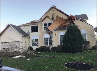  ?? PETE BANNAN - MEDIANEWS GROUP ?? A heavily damaged home on Chelsea Court at the Cobbleston­es at Thornbury following the tornado.