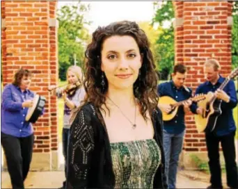  ??  ?? RUNA, made up of top Irish folk musicians from the U.S. and Canadian, performs at the Havertown Irish Festival June 24. The group features Philadelph­ia’s Shannon LambertRya­n, center, on vocals.