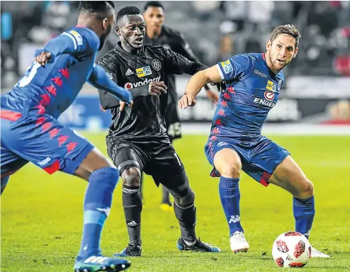  ?? Picture: Sydney Seshibedi/Gallo Images ?? Dean Furman of SuperSport under pressure from Augustine Mulenga of Pirates during the MTN 8 quarterfin­al at Orlando Stadium on Saturday