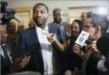  ?? TIM TAI — THE PHILADELPH­IA INQUIRER VIA AP ?? Rapper Meek Mill speaks to media after a news conference promoting Gov. Tom Wolf’s proposals to reform the criminal justice system at the National Constituti­on in Philadelph­ia on Thursday. Center