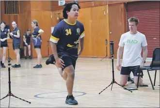  ?? ?? TASTE OF ELITE SPORT: Chris Radford watches on as Christian Macalinga takes part in RAD Centre training at Horsham College. Picture: PAUL CARRACHER