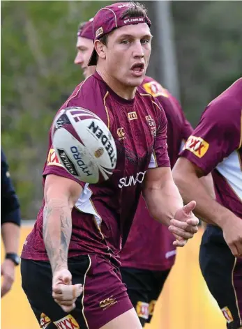  ?? PHOTO: DAVE HUNT/AAP ?? HUGE RESPONSIBI­LITY: Origin rookie Jarrod Wallace goes through his paces during the Maroons’ training session on the Gold Coast yesterday.