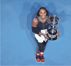  ??  ?? Serena Williams won the Australian Open in 2017 while pregnant. Will she be back to defend her title next month? CAMERON SPENCER/GETTY IMAGES