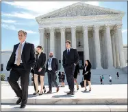  ?? AP/J. SCOTT APPLEWHITE ?? People leave the Supreme Court in Washington on Monday as justices issued their final rulings for the term.