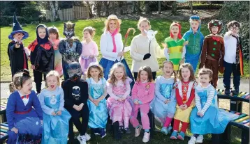  ??  ?? Ms McConnell and Ms Hughes with Junior Infants at World Book Day at St Mary & St Gerard’s NS, Enniskerry.
