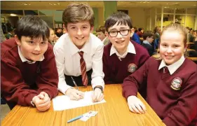  ?? Hanley Photo Joe ?? Pupils of Scoil Iosagáin, Ballybunio­n Dara O’Connor, Eva Mai Gunn, Daithí Keane and Dara Rahilly taking part in the Kerry Science Teachers’ Associatio­n Primary Schools quiz on Thursday - at the IT South Campus.