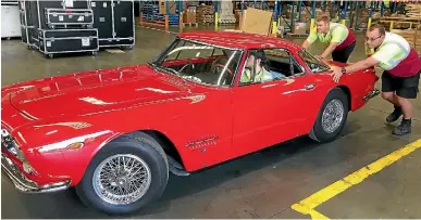  ?? SUPPLIED ?? We at Stuff obtained this photo of the Maserati 5000GT once owned by Joe Walsh being pushed around in its impound.