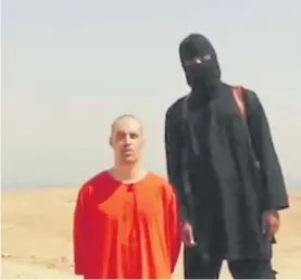  ??  ?? James Foley. Imagen de video del periodista antes de ser decapitado.