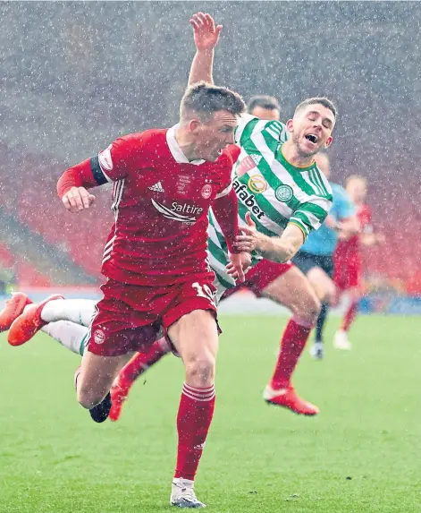  ??  ?? SIZING EACH OTHER UP: Lewis Ferguson and Ryan Christie yesterday, ahead of their cup clash at Hampden.