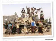  ?? STRINGER/REUTERS ?? SIAP TEMPUR: Pasukan yang setia kepada pemerintah Yaman bersiaga dengan tank di dekat Hudaida.