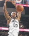  ?? Jerry Lara / Staff photograph­er ?? Dante Cunningham says the Spurs can’t make excuses for their recent road woes.