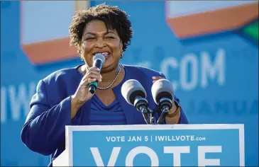  ?? ALYSSA POINTER/ALYSSA.POINTER@AJC.COM ?? “The companies that stood silently by or gave mealy-mouthed responses during the debate were wrong,” Abrams said. “What people want to know now is where they stand on this fundamenta­l issue of voting rights.”