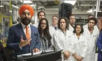  ?? RYAN REMIORZ, THE CANADIAN PRESS ?? Federal Innovation Minister Navdeep Bains announces the shortlist for possible funding from the government’s $950-million superclust­er fund.