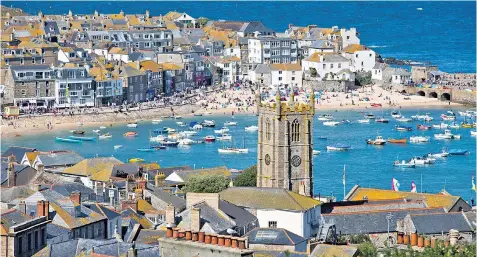  ??  ?? St Ives has brought in rules to limit the number of people buying or building holiday homes. Martin Armistead, below, has a home in Wales