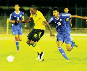  ?? FILE ?? Romeo Parkes weaved his way through two Cuban players in an internatio­nal friendly in 2015.