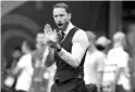  ??  ?? Southgate’s barmy army: Head coach Gareth Southgate of England is seen during the 2018 FIFA World Cup quarter-final match between Sweden and England in Samara, Russia on July 7. — XINHUA/VNA Photo