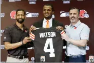  ?? ASSOCIATED PRESS FILE PHOTO ?? Cleveland Browns general manager Andrew Berry, left, new quarterbac­k Deshaun Watson, center, and head coach Kevin Stefanski pose at a news conference to announce Watson’s signing in March. Watson will reportedly meet with NFL officials this week regarding his past behavior.