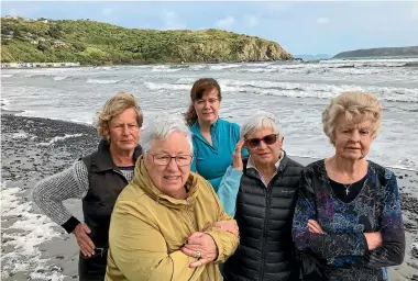  ?? JOEL MAXWELL/STUFF ?? Titahi Bay beach residents want improvemen­ts to the nearby wastewater treatment plant. From left, Lynn MacGregor, Margaret Dietrich, Michelle Laurenson, Lucy Neal and Marie Wright.