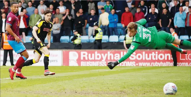  ?? PICTURES: Action Imagesv ?? SUPER SUB: Joe Newell scores for Rotherham just a minute after coming off the bench to put them 2-1 up