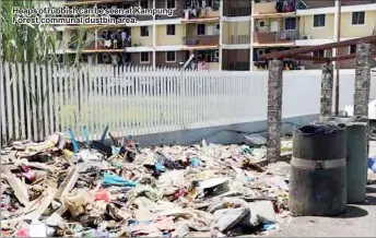  ??  ?? Heaps of rubbish can be seen at Kampung Forest communal dustbin area.