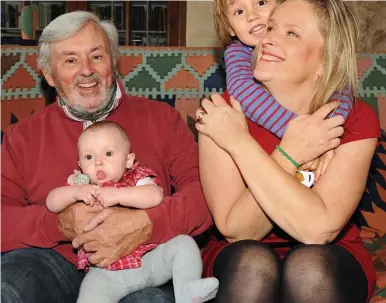  ??  ?? A father reborn: Donald and wife Claire with their young children Polly and Ben