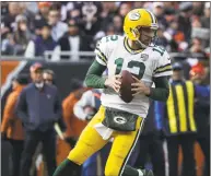  ?? David Banks / Associated Press ?? Packers quarterbac­k Aaron Rodgers plays against the Bears during a Dec. 16 game.