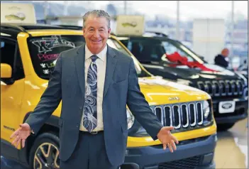  ?? PAT A. ROBINSON/MILWAUKEE JOURNAL SENTINEL ?? Jim Griffin, president of Griffin Automotive stores in Milwaukee and Waukesha, says the prospect of higher interest rates is not likely to impact the car business heading into 2017.