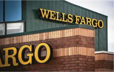  ?? Christophe­r Dilts / Bloomberg file ?? Aggressive sales goals at Wells Fargo had prompted employees to open millions of unauthoriz­ed accounts, which made headlines late in 2016. The bank has recommitte­d to serving its customers well.