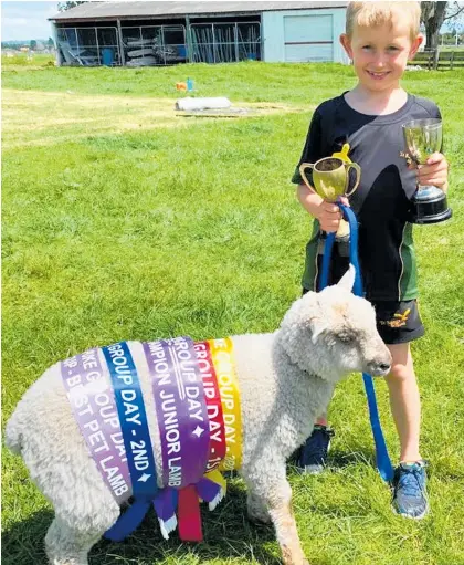  ?? ?? Max Martin from Te Ranga School with his lamb Socks.