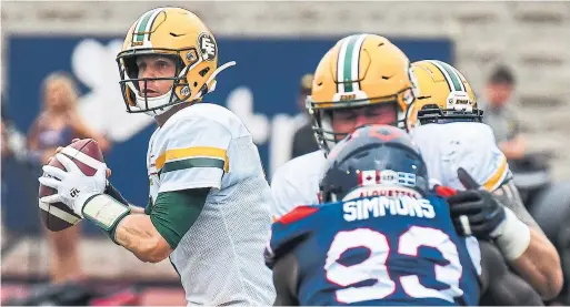  ?? DAVID KIROUAC GETTY IMAGES ?? Edmonton quarterbac­k Trevor Harris stole the show in Sunday’s 37-29 East Division semifinal win over Montreal, going 36-of-39 in passing for 421 yards and a TD.