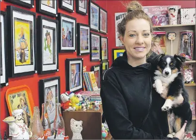  ?? MILLICENT MCKAY/JOURNAL PIONEER ?? Josina Frizzell, owner of Vintage, with pup Frisco in her store. Frizzell will be opening a second location of her store this summer at Spinnakers’ Landing in Summerside.