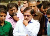  ??  ?? Former Karnataka deputy chief minister & senior congress leader G Parameshwa­ra visits the spot where his personal assistant Ramesh was found hanging from a tree, on the Sai Grounds at the Jnana Bharathi University campus, in Bengaluru, on Saturday