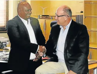  ?? The Herald ?? All smiles: Deputy mayor Mongameli Bobani, left, with mayor Athol Trollip in the early days of the Nelson Mandela Bay coalition. The EFF warned the DA last week that the party’s conduct in Nelson Mandela Bay in ousting of Bobani was unacceptab­le. /