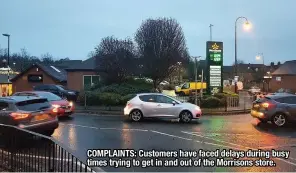  ??  ?? COMPLAINTS: Customers have faced delays during busy times trying to get in and out of the Morrisons store.