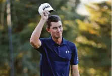  ??  ?? Maverick McNealy tips his hat after making eagle on No. 18 to lose by one stroke to Homa during the Fortinet Championsh­ip.