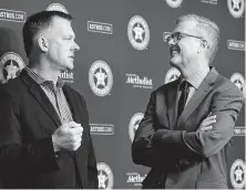  ?? Yi-Chin Lee / Staff photograph­er ?? Astros manager A.J. Hinch, left, and general manager Jeff Luhnow are eager to see what the new season will bring.
