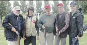  ??  ?? Among those firing more than 10,000 shots at the Edmonton Gun Club Saturday as they sought to raise $20,000 for the Stollery Children’s Hospital were team members, from left, Nick Lees; Alexander Rudl, 13; club president and shoot organizer Jack...