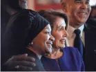  ??  ?? Nancy Pelosi visits Cathy’s Kitchen, owned by Cathy Jenkins, foreground, on a trip to Ferguson, Mo., last month to promote Democratic policies.