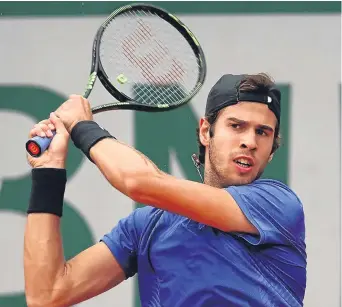  ?? Picture: Getty. ?? Karen Khachanov’s power was of no avail against the grit and guile of the world No 1.