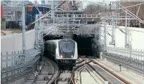  ?? ?? A Class 345 emerges from the Victoria Dock Portal (near Custom House) while on test in 2021.