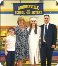  ?? Photograph by Elizabeth Zbinden ?? The Miller family poses for the camera. Damon, right, is president of the Morrisvill­e School Board. Also pictured, from left, are Evan, Judie and Lauren, the graduate.